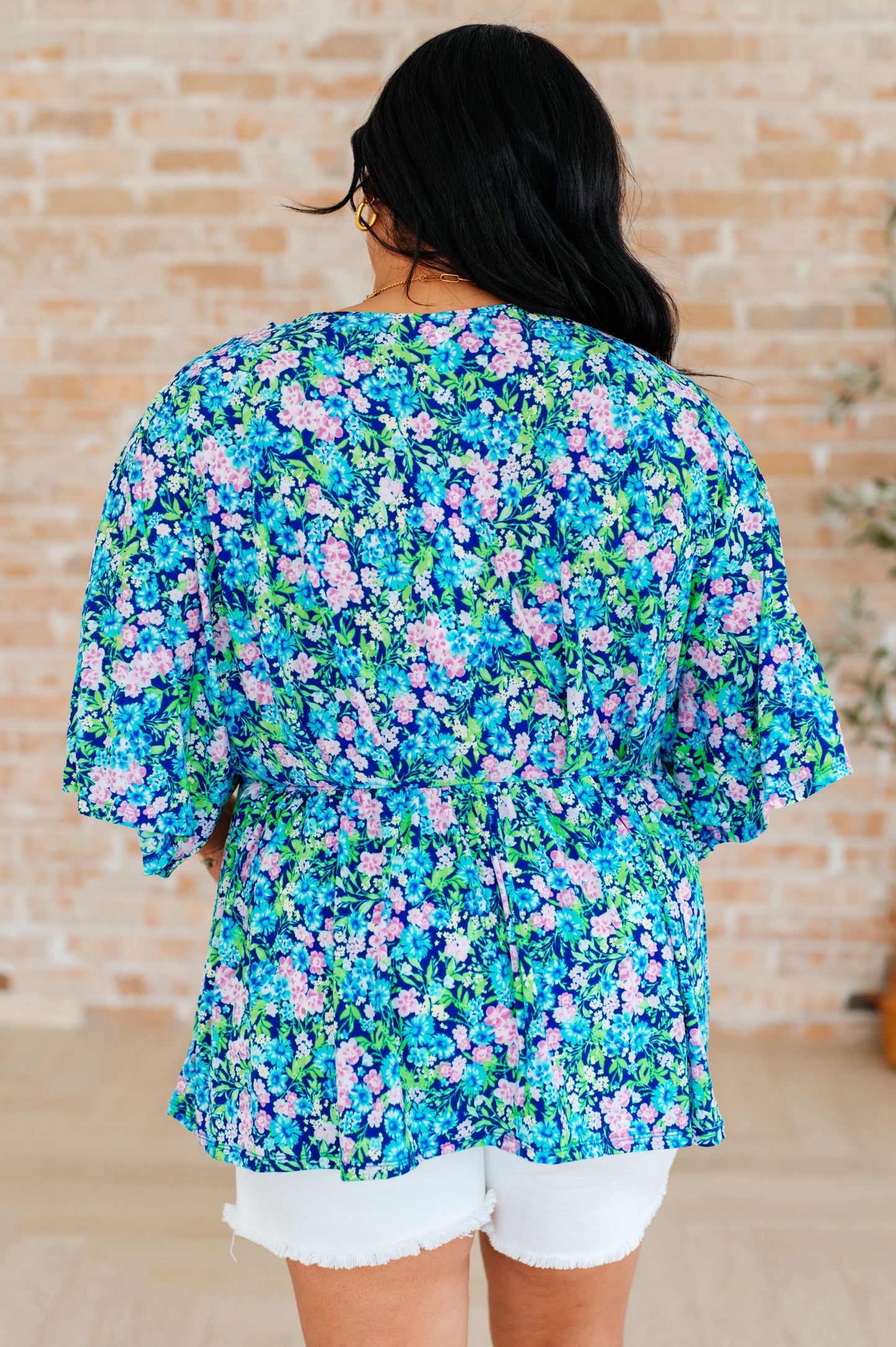 Top peplum Dreamer en azul marino y floral menta