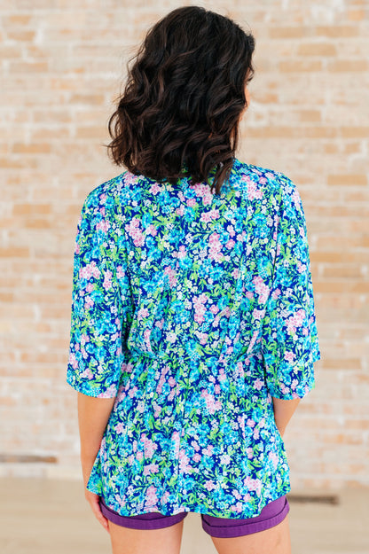 Top peplum Dreamer en azul marino y floral menta