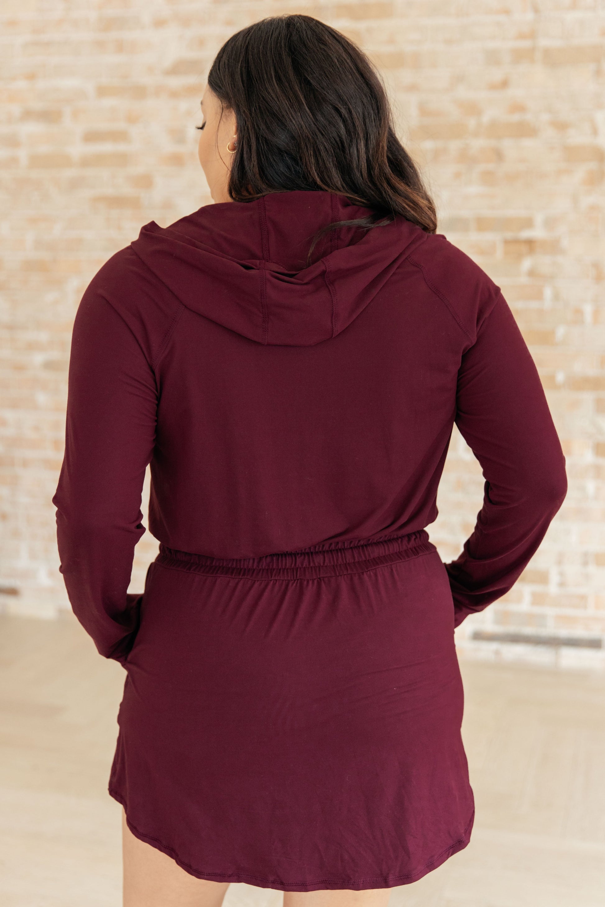 Getting Out Long Sleeve Hoodie Romper in Maroon - Dahlia Boutique